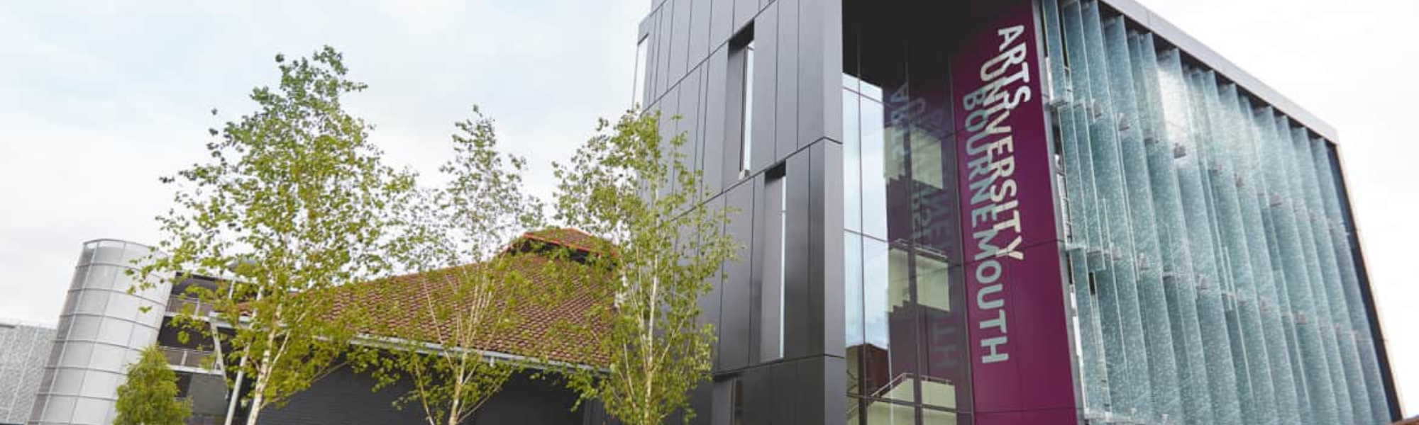 Arts University, Bournemouth with trees on the left