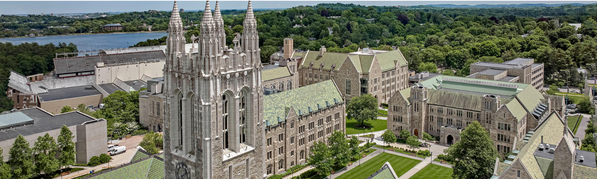 Boston College with lake and greenery in the backgorund