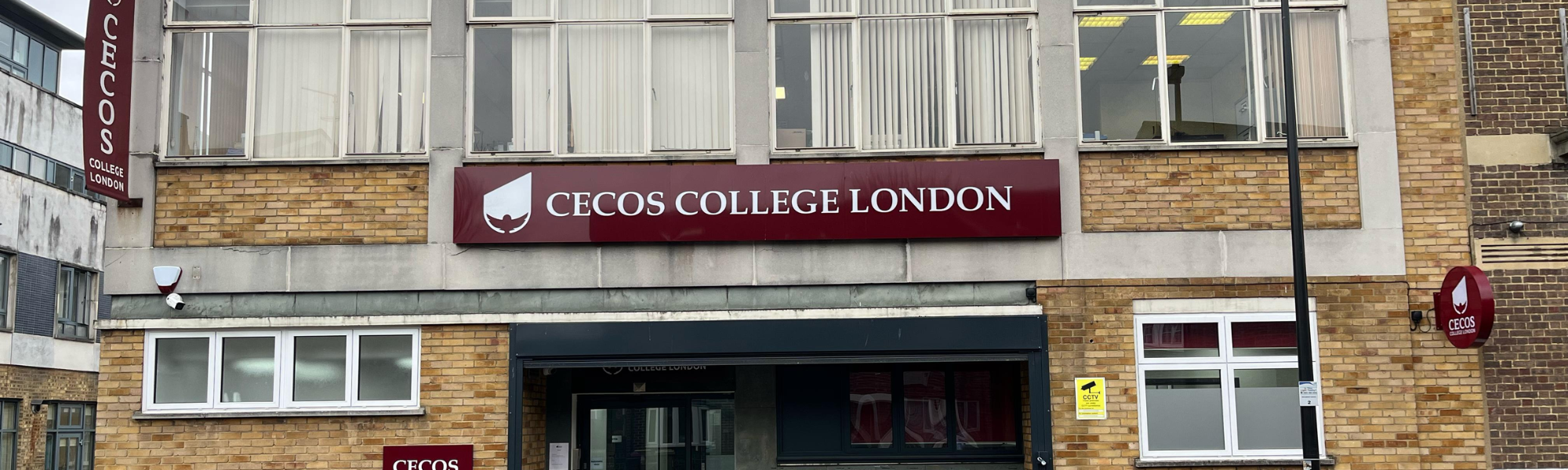 CECOS College close-up shot of the logo on building