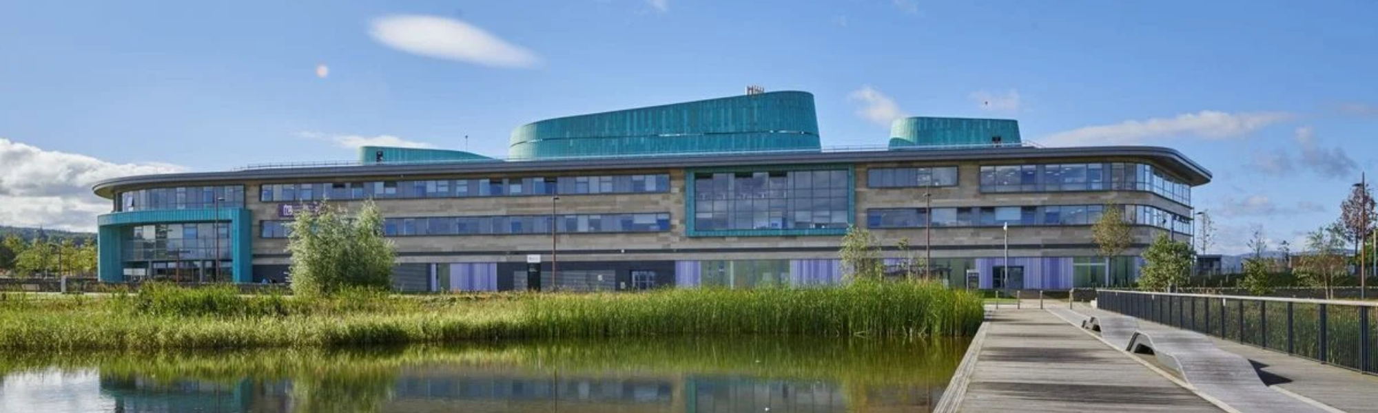  Highlands & Islands University with lake and grass