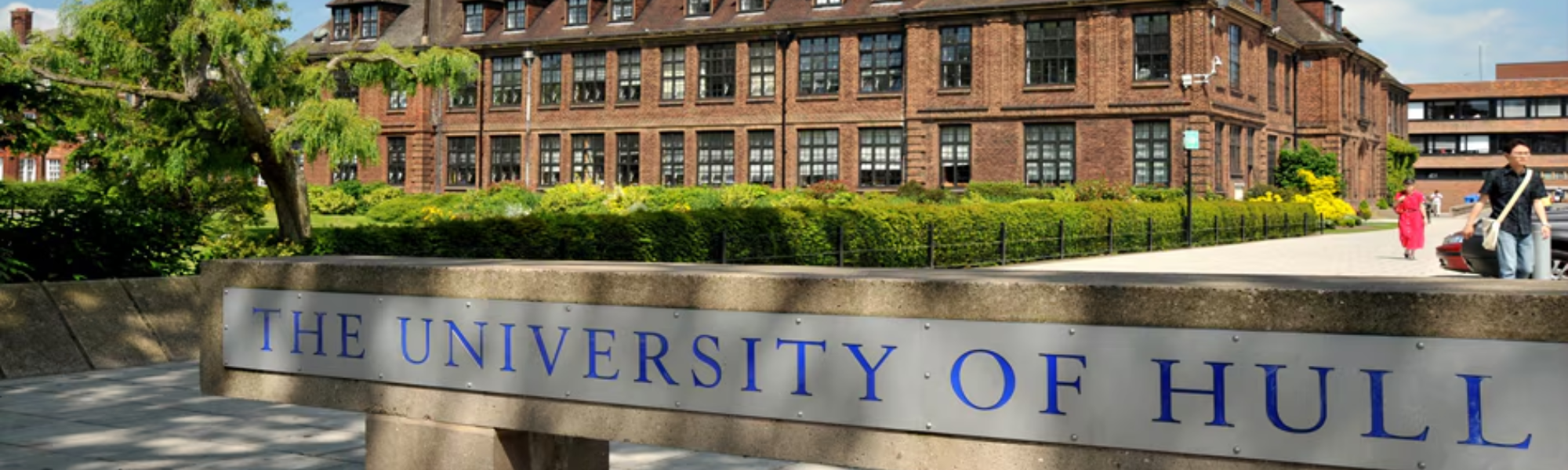 Hull University with trees and school sign